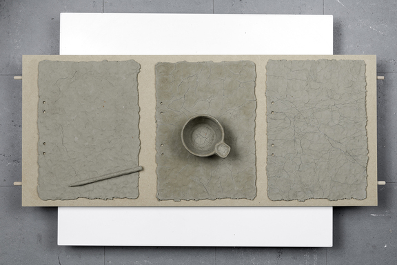 bredde_1600_from lumps of materia. unfired clay, paper, wood, plastic, glue, mdf board. 32x9x79 cm. 2014. photo, Håkan Lidman